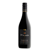 A bottle of Miopasso Primitivo wine with a black label, featuring the text 'Primitivo' and the year '2023/24'.